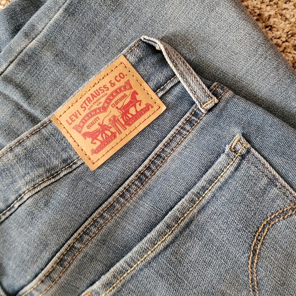 Levi's 712 Slim Ripped Jeans